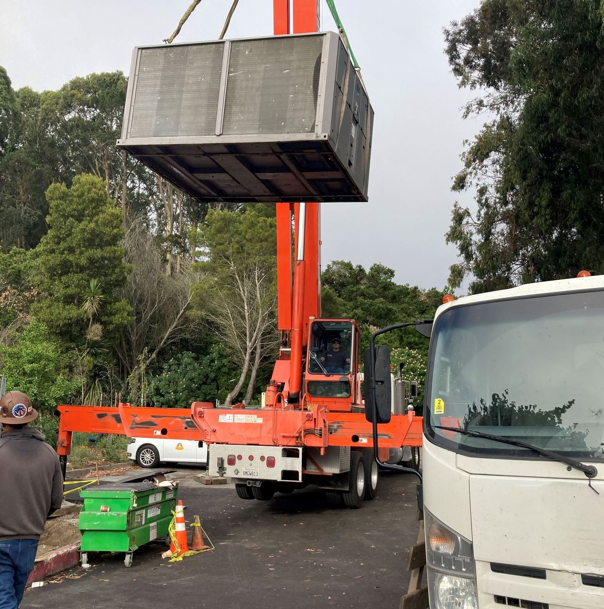 Image of HVAC equipment being raised 